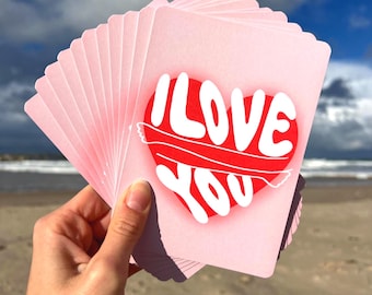 Set de postales "Te amo" con un corazón abrazado: tarjetas de aniversario, amistad y San Valentín.