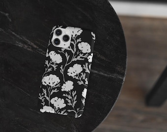Funda para teléfono con silueta floral blanca sobre fondo negro / Funda resistente para iPhone 17-XS MAX, Samsung Galaxy S25-S20 Ultra
