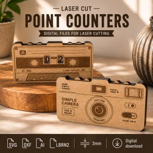 May include: Two laser-cut wooden point counters featuring engraved designs of a vintage cassette tape and a simple camera. The cassette tape displays the text A, C-90, and LOW NOISE. The camera features the text SIMPLE CAMERA, 35MM SIMPLE CAMERA, 31MM LENS, FOCUS FREE, and FLASH ON. The image includes icons for SVG, DXF, AI, LBRN2, and a 3mm thickness indicator.