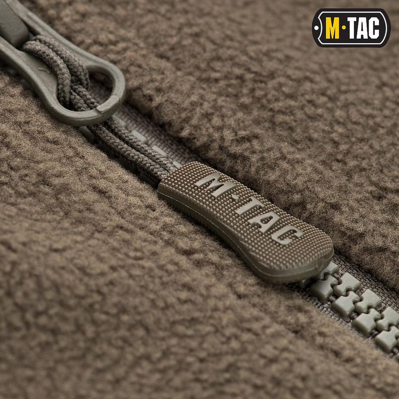 Green tactical coat with 5 external pockets