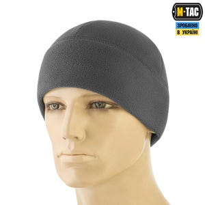May include: A dark gray fleece beanie hat. The hat is a solid color and has a simple, classic design. The M-TAC logo and text "Made in Ukraine" are visible on the upper right corner.