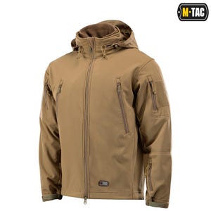 May include: A tan softshell jacket with a hood, multiple zipped pockets, and a full-length zip closure. The jacket features a patch on the upper arm and the "M-TAC" logo in the upper right corner.