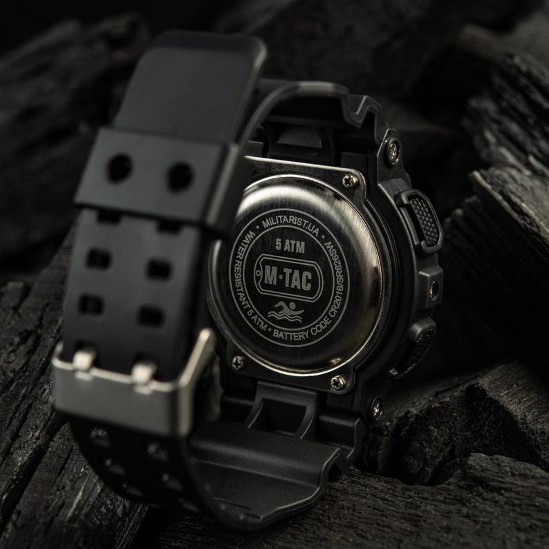 Detailed view of the tactical digital display with high-contrast electronic movement.