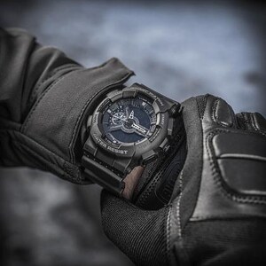 M-Tac military watch featuring a reinforced buckle on a premium black silicone strap.