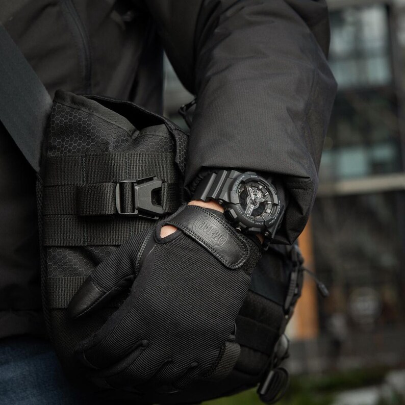 M-Tac Sport Black wristwatch with non-reflective matte finish for stealth operations.