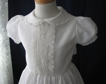 First Communion Dress, Hand made with Swiss cotton. Embellished with fine hand embroideries and bobbin lace trims