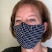 lynneoboe reviewed Washable cotton mask, hand made, with filter pocket and wire insert to make it fit snug at the nose