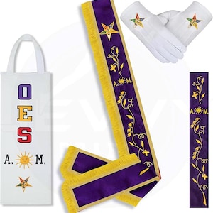 May include: A purple and gold Masonic sash with a fringe border. The sash has embroidered symbols including a sun, a star, and a flower. The sash is accompanied by a white tote bag with the letters "OES" and the text "A.M.M." embroidered on it. The bag also has a small embroidered star.