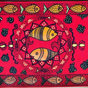 May include: A vibrant red drawing featuring a repeating fish pattern. The central design showcases two stylized fish within a floral wreath. The artwork includes orange, yellow, black, and green accents, creating a lively and decorative composition.