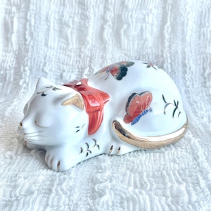 Vintage Sleeping Porcelain Cat Figurine: Hand-Painted Butterfly & Gold Trim