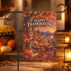 May include: A rectangular garden flag hanging on a black metal stand, featuring an illustration of forest animals gathered around a table with a pie. The text 'HAPPY THANKSGIVING' is printed in white at the top, surrounded by autumn leaves.