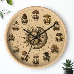 May include: A round wall clock with a light wood frame. The clock face features a vintage illustration of a sun and moon with mushroom illustrations around the clock face. The clock hands are black.