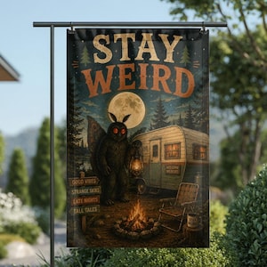 May include: A garden flag with a retro illustration of a moth-like creature, campfire, and caravan. The flag displays "STAY WEIRD" in a vintage font, with additional text including "Good Vibes" and "Strange Skies."