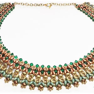 May include: A multi-layered beaded necklace with a gold chain closure. The necklace features green, gold, and copper beads arranged in a graduated pattern.