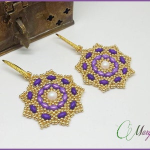 May include: A pair of purple and gold beaded earrings with a pearl in the center of each earring.
