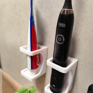 An der Wand befestigter Zahnbürsten- & Zahnpasta-Halter - wasserdicht, kein bohren, leicht zu reinigen, modernes smartes Design
