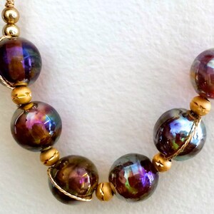 Purple, Gold, Green & Iris Metallic Golden Glow Lampwork Glass Wire Wrapped Necklace with Gold Chain