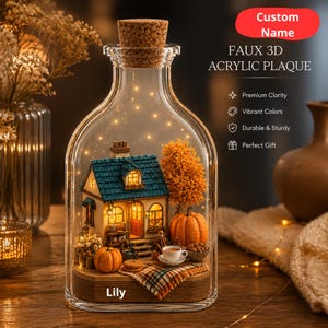 May include: A glass bottle with a cork stopper, containing a miniature autumn scene. It features a small house with a blue roof, pumpkins, and a tree, lit by fairy lights. The text "FAUX 3D ACRYLIC PLAQUE" is displayed.