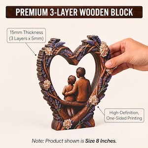 May include: A heart-shaped wooden block with 15mm thickness, featuring a 3-layer design. It displays a printed scene of two figures sitting together, decorated with lavender and white flowers. The text reads PREMIUM 3-LAYER WOODEN BLOCK and Size 8 Inches.