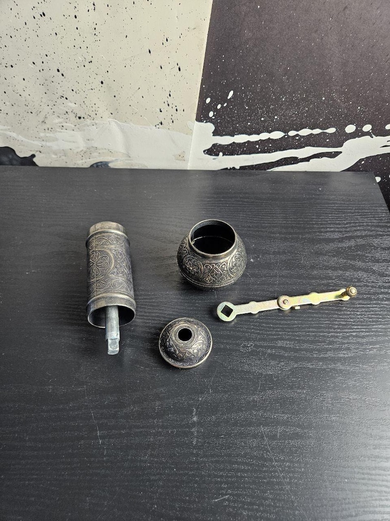 Grinding Mechanism Close-Up:
"Close-up of stainless steel conical burr for precise espresso, French press, or pour-over grinding."
 Portable Size:
"Compact grinder beside coffee mug, lightweight and ideal for travel or camping
Disassembled View:
"Exploded view showing burr, handle, and removable parts for easy cleaning."

Lifestyle Shot:
Eco-Friendly Packaging:
"Plastic-free recycled cardboard box with kraft paper, sustainable unboxing experience."