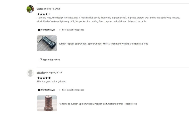 May include: A dark-colored, cylindrical Turkish spice grinder with a metal hand crank on top. The body features an intricate, embossed pattern and a rounded base. The product is labeled as a 4.3 inch, 5 ounce, plastic-free pepper and salt mill.