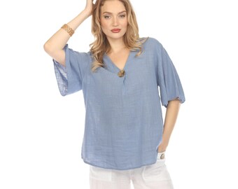 Top liso con cuello en V y mangas acampanadas en azul vaquero