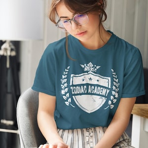 Rigel Zodiac Academy Tee | Officially Licensed Zodiac Academy Shirt | Max Rigel Merch | Siren Fantasy Bookish Tee for Readers