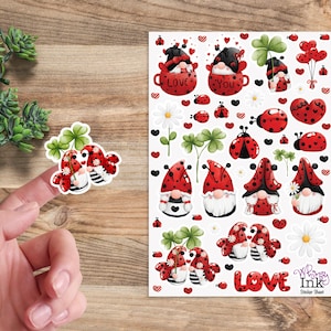 May include: A sticker sheet featuring various illustrations of gnomes dressed in ladybug-themed outfits, red hearts, ladybugs, clovers, and daisies. The text "LOVE" and "Whimsy Ink Sticker Sheet" are printed in the bottom right corner of the sheet.