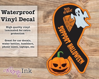 May include: A black ribbon-shaped vinyl decal with an orange border featuring a white ghost, an orange spiderweb, and an orange jack-o'-lantern. The text reads Trick or Treat and Support Halloween. The decal is displayed next to text describing it as a waterproof vinyl decal.