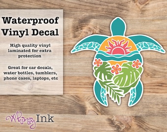 May include: A vinyl decal shaped like a sea turtle featuring a teal outline and a colorful interior graphic. The design includes a red sun, blue waves, green tropical leaves, and orange flowers. Text on the left reads Waterproof Vinyl Decal.