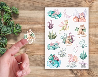 May include: A sticker sheet featuring various watercolor illustrations of small dragons, a crescent moon, and plants. The sheet includes the text Whimsy Ink Sticker Sheet in the bottom right corner. One individual dragon sticker is shown separately.