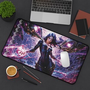 May include: A rectangular mousepad featuring a fantasy character with purple hair and a dark outfit, set against a background of purple and blue hues. The mousepad has a black border and a series of numbered circles along the left edge.