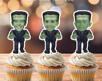 May include: Three cupcakes topped with personalized Frankenstein-themed toppers. The toppers feature a cartoon image of a person with green skin, black hair, and a black suit. The cupcakes have white frosting and are on a wooden surface. Text on the image reads "Personalized CUPCAKE TOPPERS".