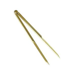 May include: A golden-colored compass, a drafting tool with two pointed legs connected at the top by a hinge and a small adjustment wheel. The tool is designed for measuring distances and drawing circles.