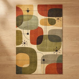 May include: A rectangular area rug with a mid-century modern design. The rug features rounded shapes in shades of green, orange, yellow, and gray on a cream background. Black lines and starburst details add to the retro aesthetic.