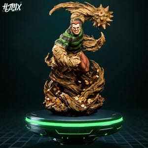May include: A detailed statue of a comic book character, Sandman, in a dynamic pose. The figure is sculpted with intricate details, featuring a green and black striped shirt, and a sand-like texture. The base is a futuristic platform with a glowing green outline.