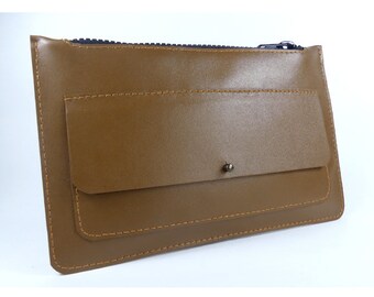 Brown leather bag pouch, with a zip closure and a front flap pocket
