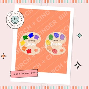 May include: Two beige artist palettes with colorful paint blobs, featuring the text artwork by Liam and artwork by Ronan. Includes a circular digital download icon, four-pointed star graphics, and a pink banner labeled LASER READY SVG.