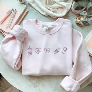 Nursing Embroidered Sweatshirt, Nurse Coquette Crewneck, Nursing Student Outfit, Nursing Bow Sweatshirt, Medical Icons Crewneck for Nurses