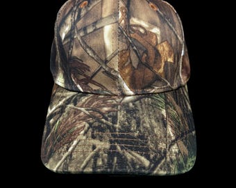 Gorra de camuflaje Real Tree, ideal para actividades al aire libre como caza y camping.