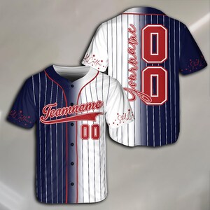 May include: A white and navy blue baseball jersey with red and white stripes. The jersey has a white front with a red number "00" and the text "Teamname" in red. The back of the jersey is navy blue with a white number "00" and the text "Your name" in red.