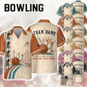 May include: A short-sleeve button-down shirt featuring a bowling theme with a cream base, orange sleeves, and a collar. The design includes a bowling ball, pins, and a city skyline graphic with the text "TEAM NAME" and "CUSTOM TEXT HERE".