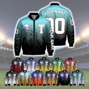 May include: A baseball bomber jacket with a gradient color design, featuring a front zipper, ribbed collar, and cuffs. The chest displays a baseball logo with the text ISABELA and a letter T. The back shows the text YOUR NAME and the number 00.