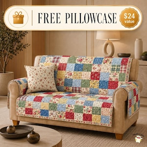 May include: A beige sofa covered with a quilted patchwork throw featuring squares of red, blue, yellow, and green floral and plaid patterns. A matching square throw pillow sits on the left side. A banner above reads FREE PILLOWCASE $24 value.