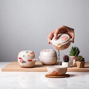Encantador juego de té de viaje de cerámica: tetera y taza compactas, regalo portátil para amantes del té, juego de té de estilo japonés.