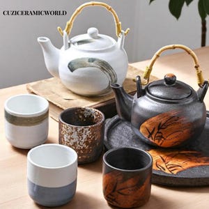 Vintage Japans porseleinen theeservies – theepot met bamboe handvat, zwart-witte kopjes