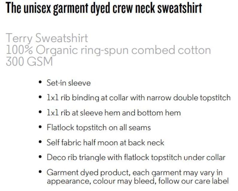 Puede incluir: Descripci&oacute;n de texto de una sudadera unisex te&ntilde;ida en prenda con cuello redondo. Incluye manga montada, ribete de canal&eacute; y pespunte plano. Fabricada en algod&oacute;n peinado 100% org&aacute;nico hilado en anillo, 300 GSM. El producto te&ntilde;ido en prenda puede variar en apariencia.