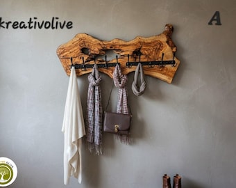 Armadio artigianale in legno d'ulivo: un pezzo unico e naturale.
