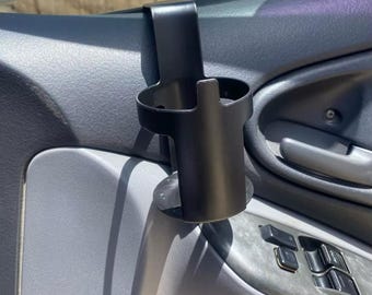 Expansor de portavasos para coche: portavasos ajustable para botellas y tazas grandes, organizador universal para viajes y uso diario.