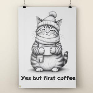 May include: Black and white illustration of a cat wearing a hat, scarf, and holding a coffee mug. The text "Yes but first coffee" is at the bottom of the image. The cat has striped fur and a smiling expression.